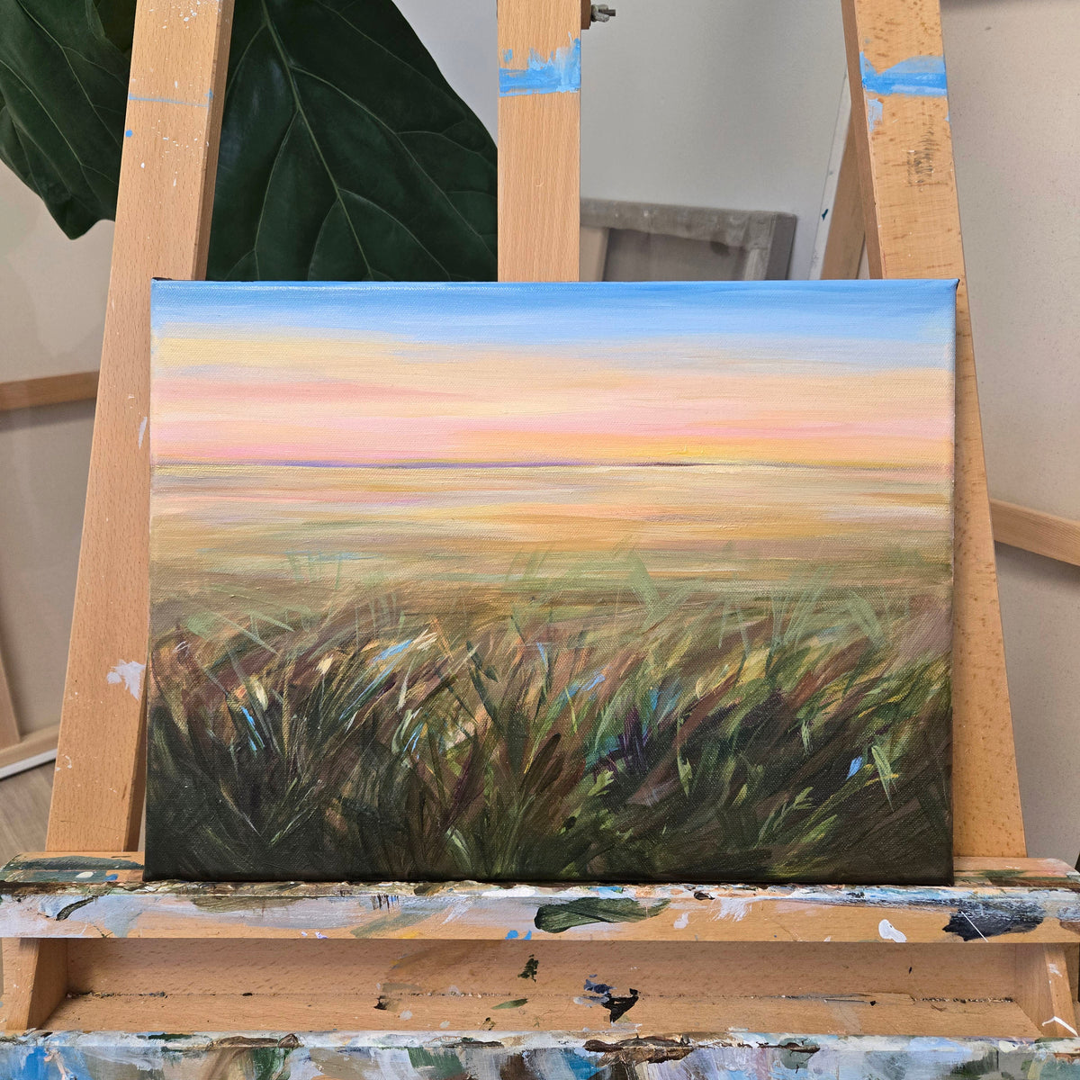 Landscape painting on an easel by Saskatchewan Artist Nicole Walsh