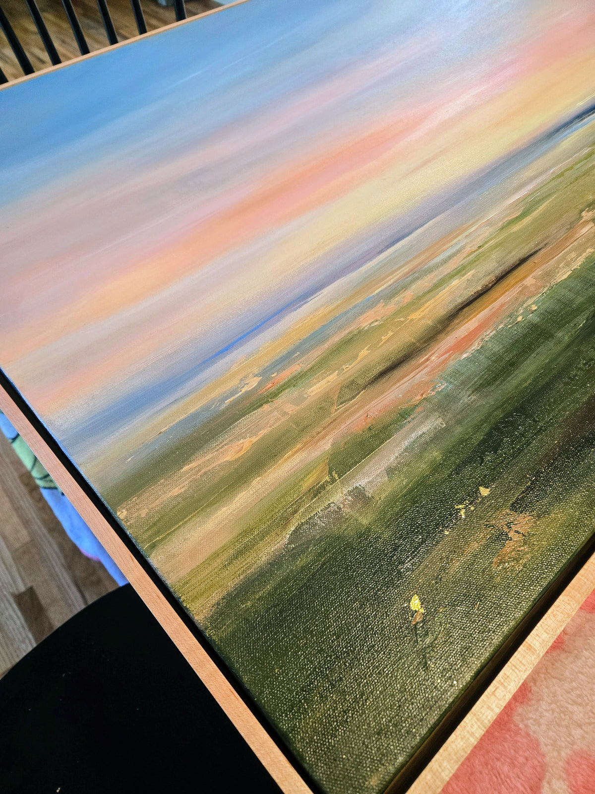 Peaceful textured canvas painting of a colorful sunset